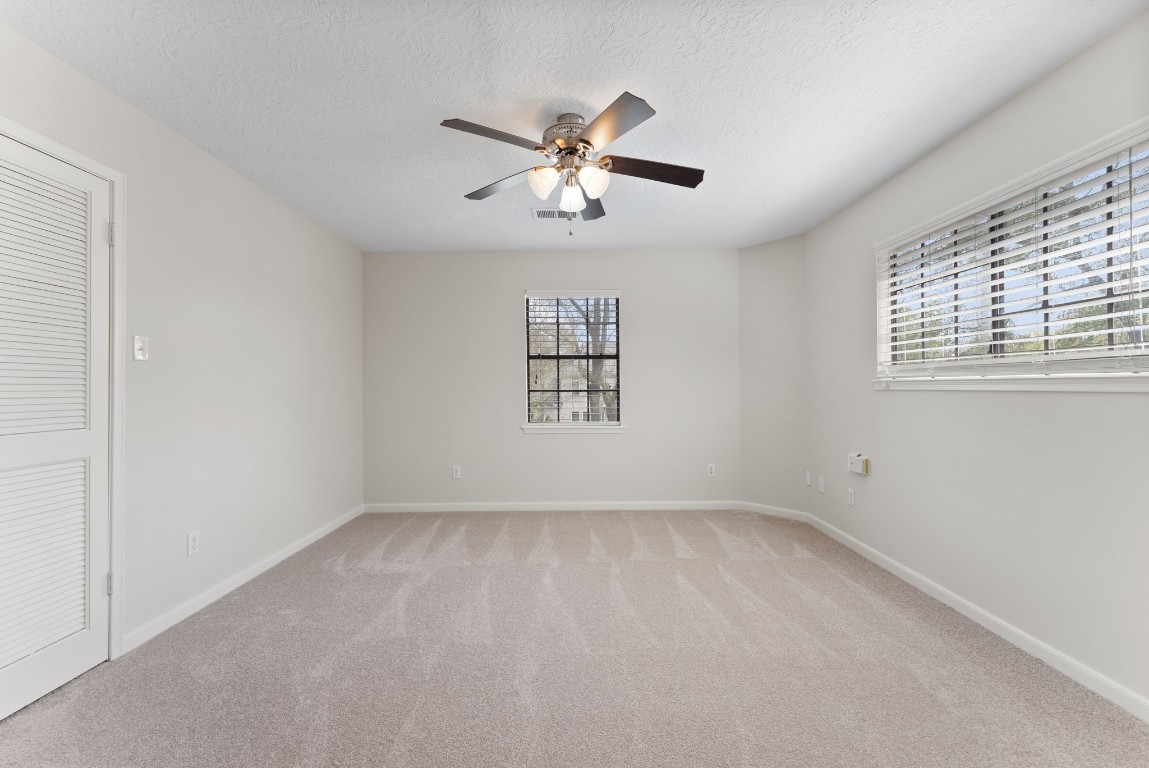 16927 Windypine Drive Spring, TX 77379 - Photo 24 of 46 a view of an empty room with a window