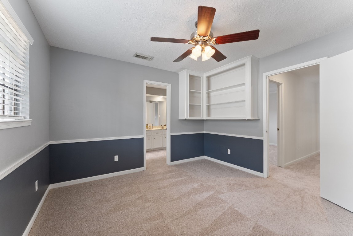 16927 Windypine Drive Spring, TX 77379 - Photo 27 of 46 a view of an empty room with a window