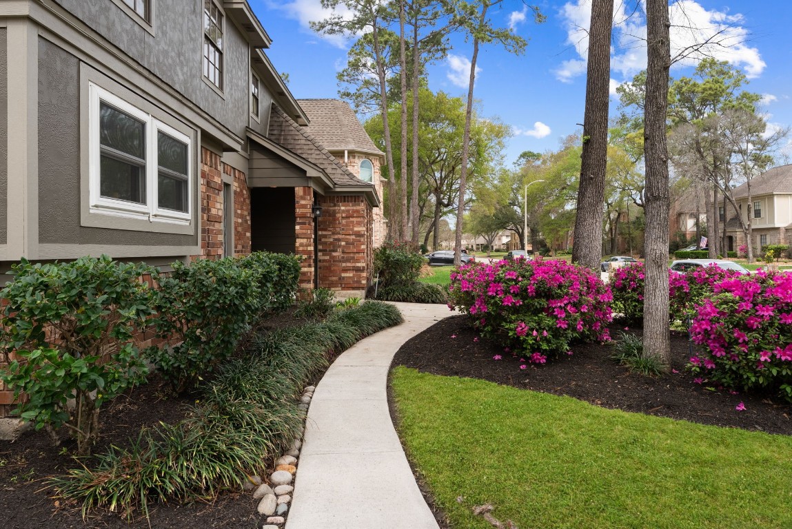 16927 Windypine Drive Spring, TX 77379 - Photo 3 of 46 a view of a flowers in front of a house