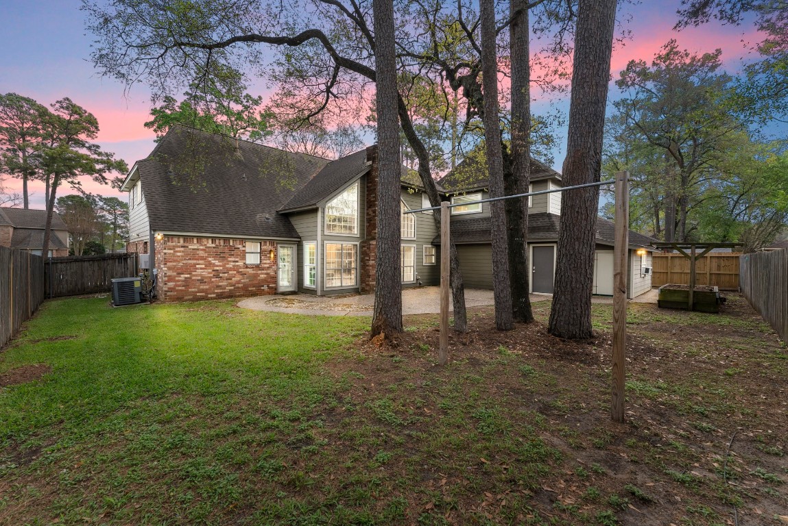 16927 Windypine Drive Spring, TX 77379 - Photo 30 of 46 a view of a house with a back yard