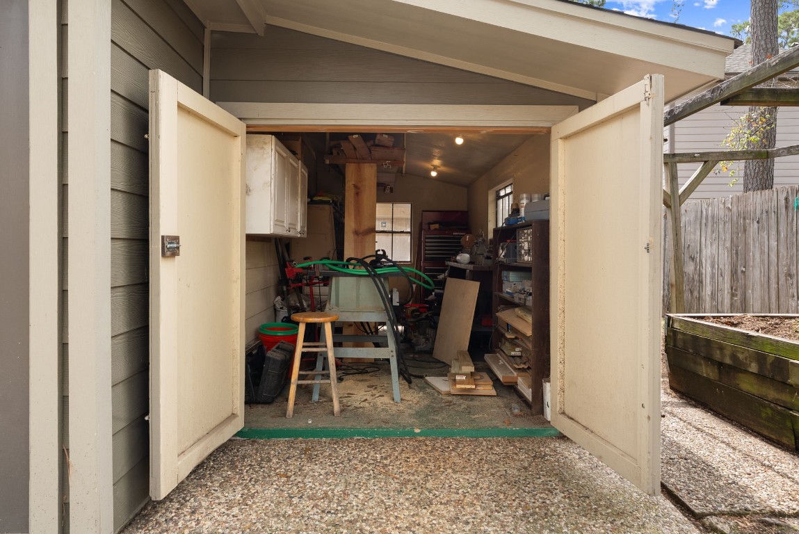 16927 Windypine Drive Spring, TX 77379 - Photo 34 of 46 a view of a hallway with a dining room and kitchen