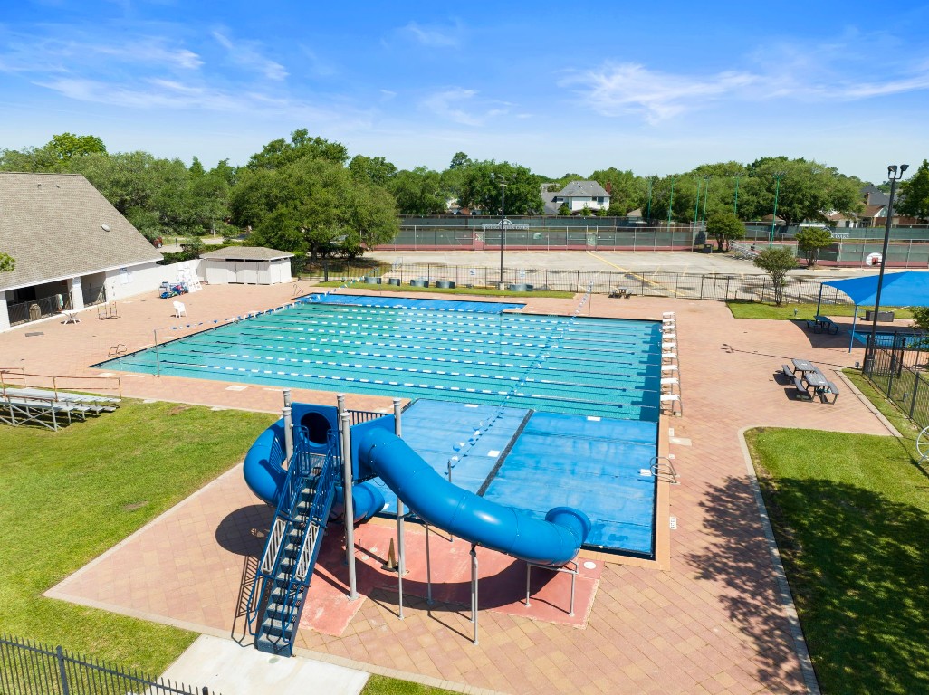 16927 Windypine Drive Spring, TX 77379 - Photo 40 of 46 a view of a swimming pool with lawn chairs
