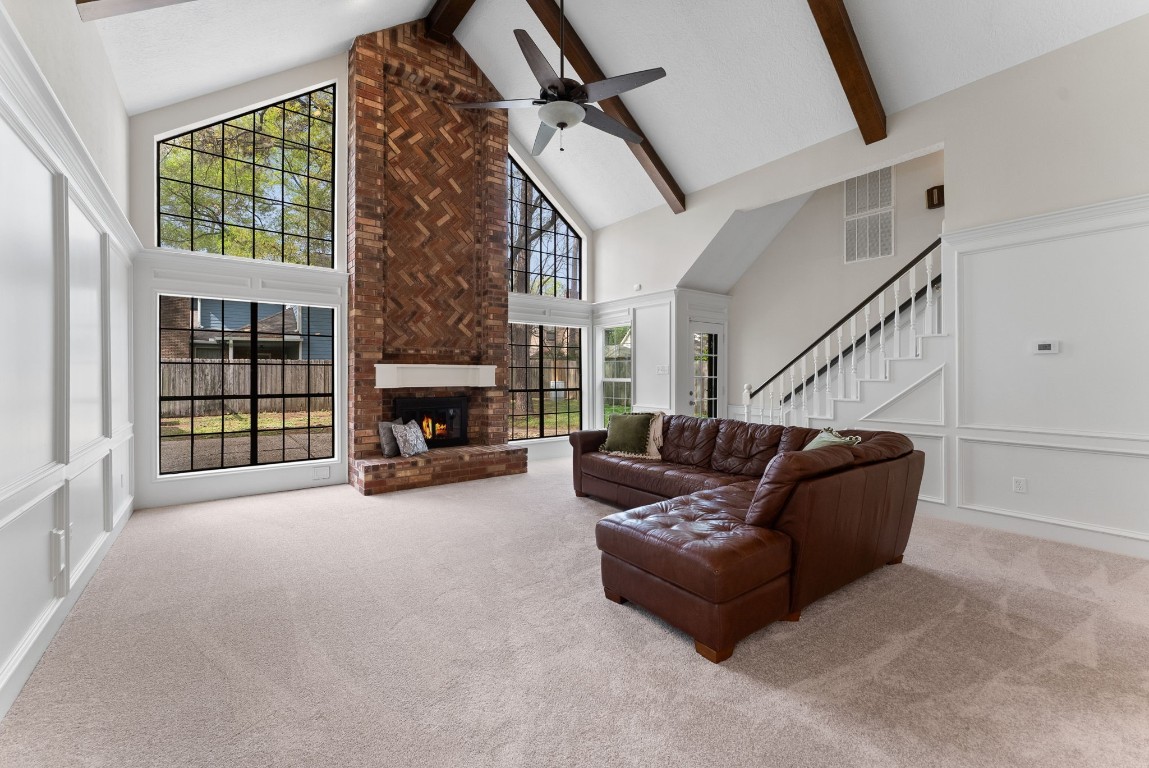 16927 Windypine Drive Spring, TX 77379 - Photo 7 of 46 a living room with furniture and a fireplace