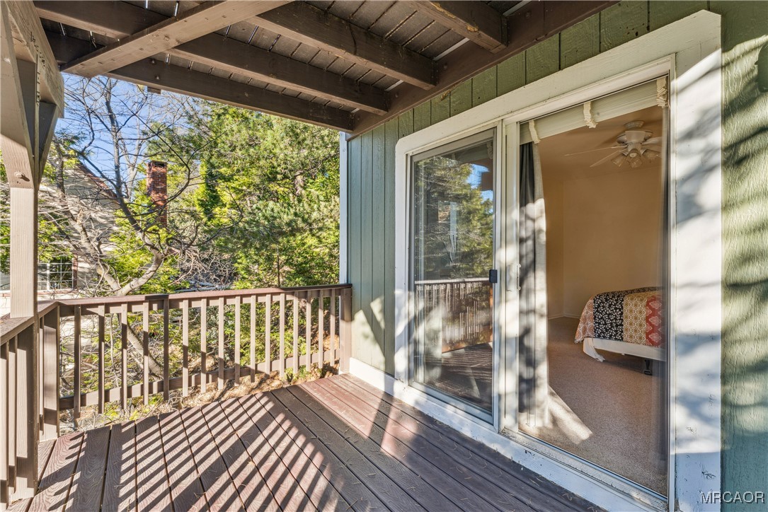 305 Summit Road Lake Arrowhead, CA 92352 - Photo 37 of 47 a view of a balcony with wooden floor