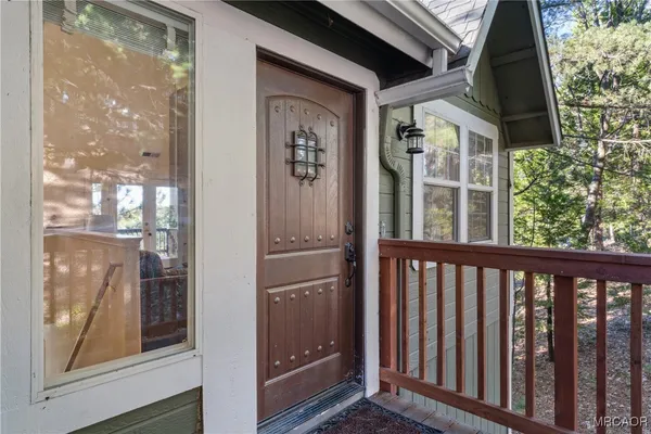 a view of a balcony with a door