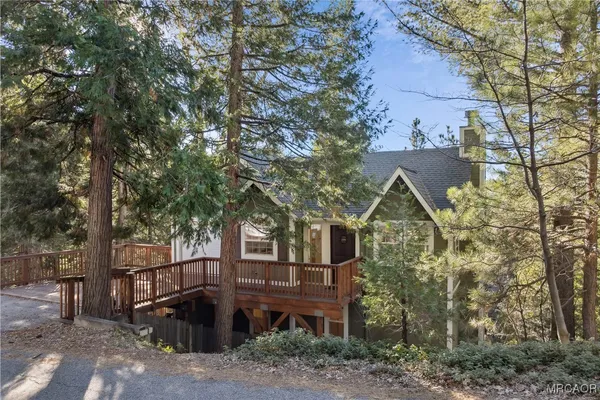 a view of a house with a roof deck
