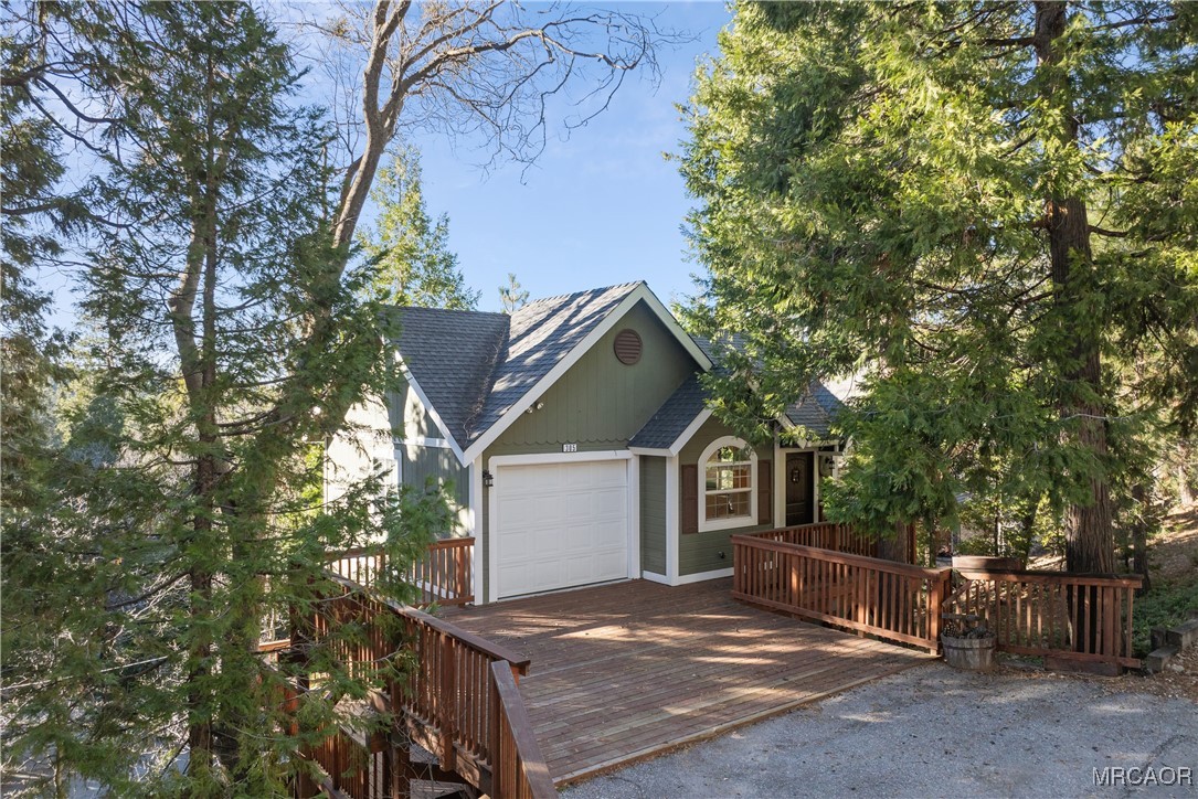 305 Summit Road Lake Arrowhead, CA 92352 - Photo 42 of 47 a view of a house with a tree