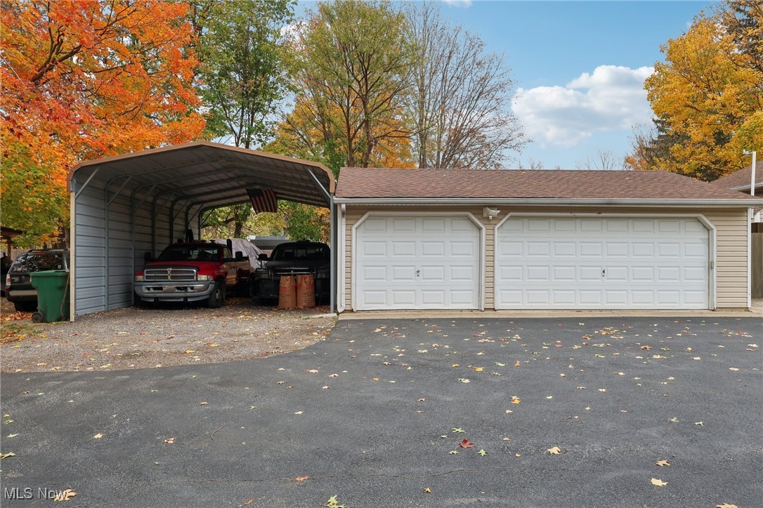7995 Johnnycake Ridge Road Mentor, OH 44060 - Photo 33 of 47 Garage with a carport