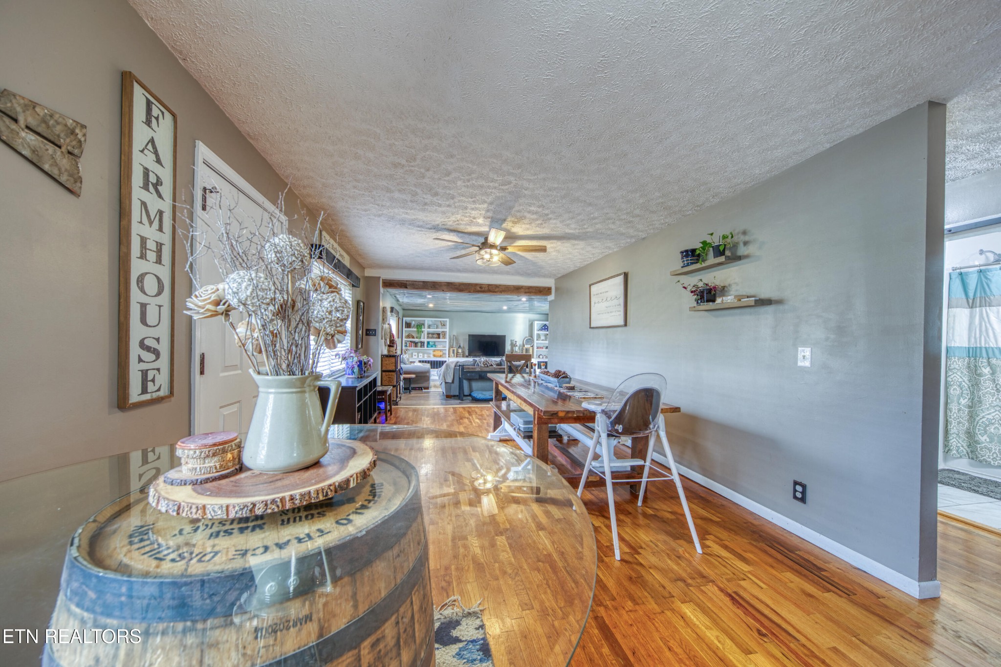 2415 Riddle Road New Market, TN 37820 - Photo 16 of 41 a living room with furniture and a chandelier