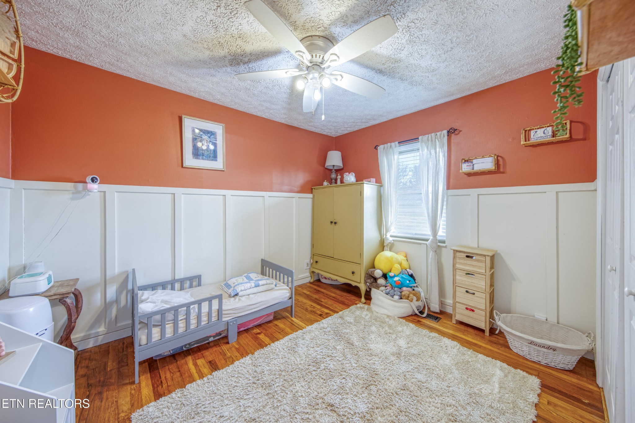 2415 Riddle Road New Market, TN 37820 - Photo 17 of 41 a bedroom with furniture and a chandelier