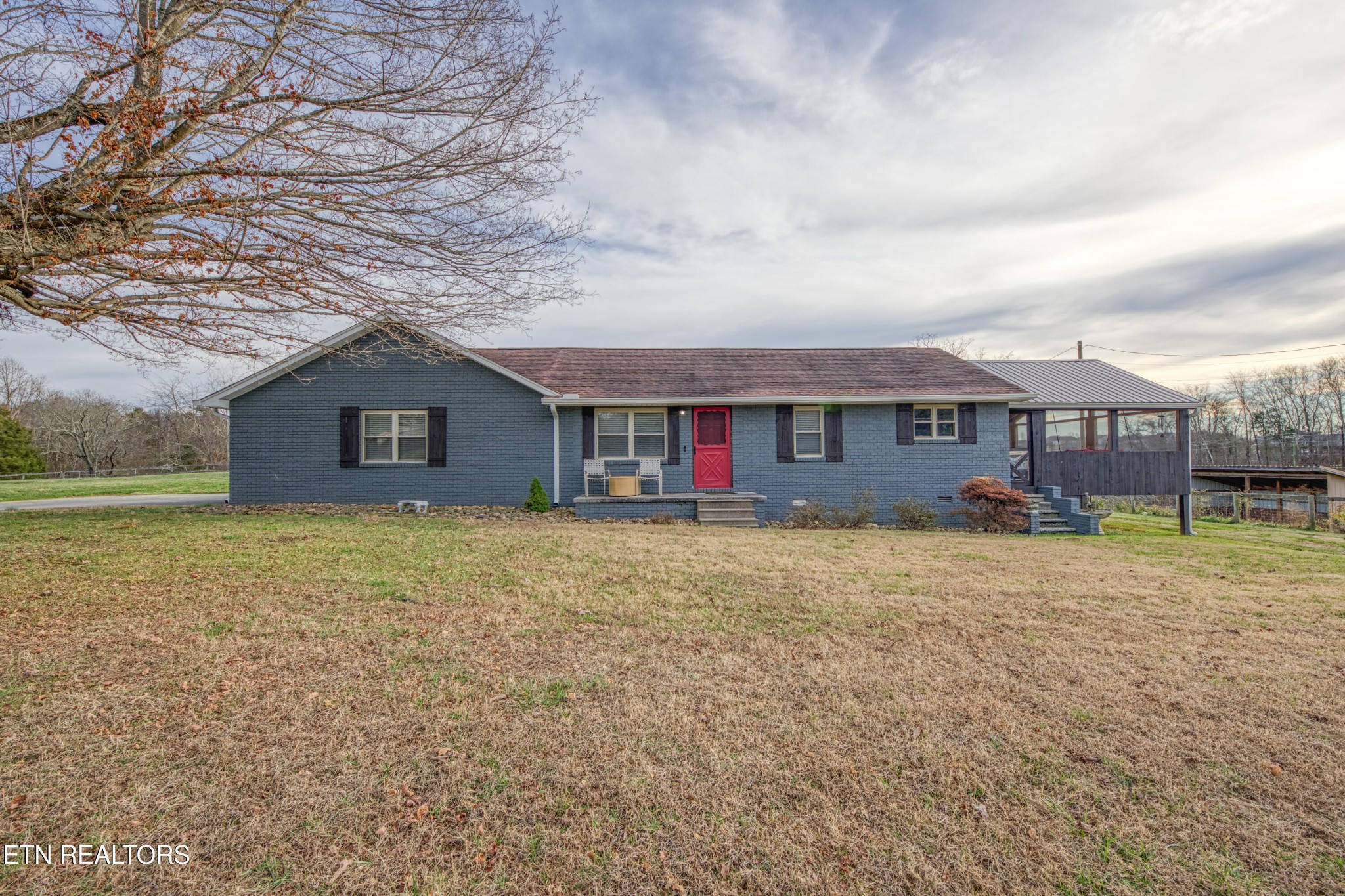 2415 Riddle Road New Market, TN 37820 - Photo 2 of 41 a front view of a house with a yard