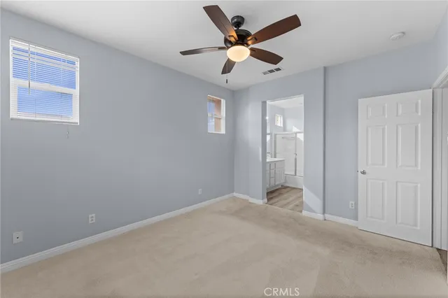 a bathroom with a double vanity sink mirror double and shower