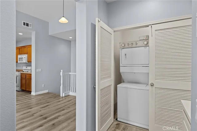 a view of a balcony with furniture