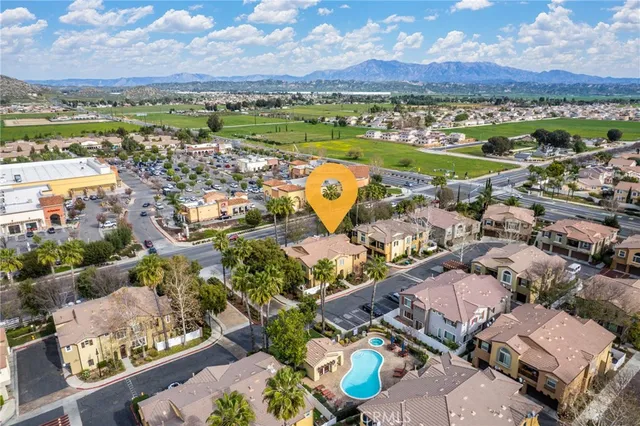 an aerial view of a house with a ocean view