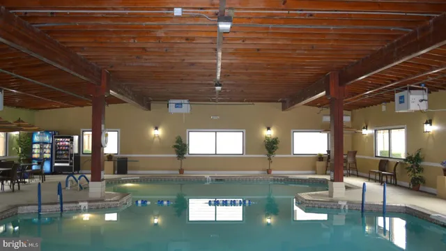 a room with furniture and a flat screen tv