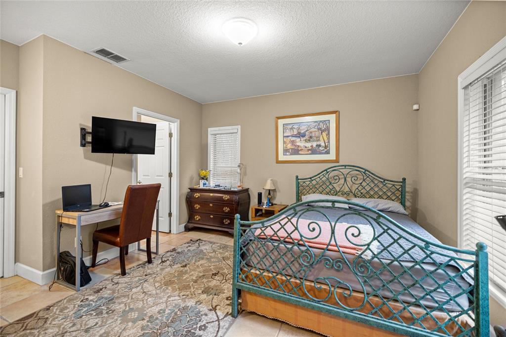 4280 Southeast 26th Terrace Road Ocala, FL 34480 - Photo 37 of 70 a view of a workspace with furniture and a window