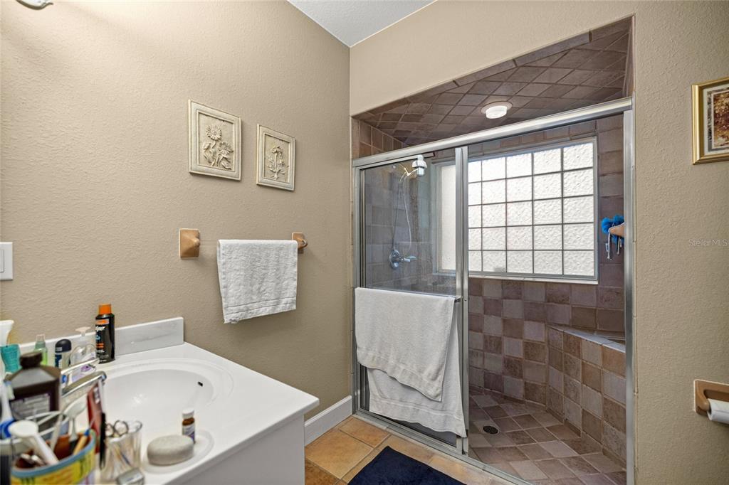 4280 Southeast 26th Terrace Road Ocala, FL 34480 - Photo 40 of 70 a bathroom with a tub and a window