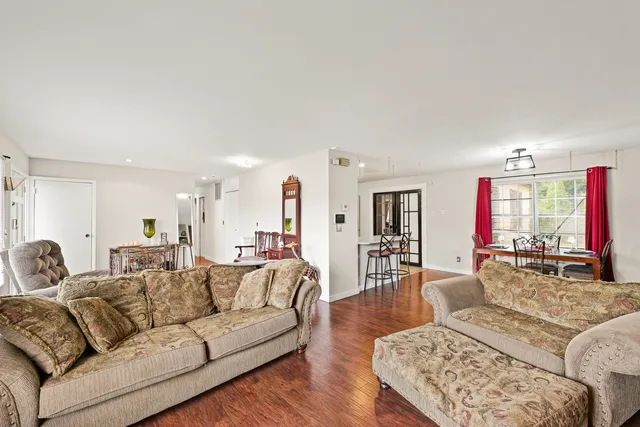 a living room with furniture and a couch