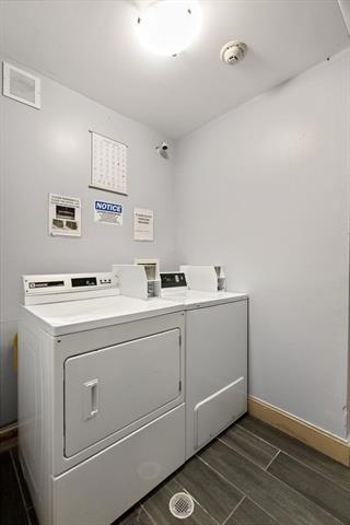 263 1st Street, Unit 2R Hoboken, NJ 07030 - Photo 11 of 13 a utility room with dryer and washer