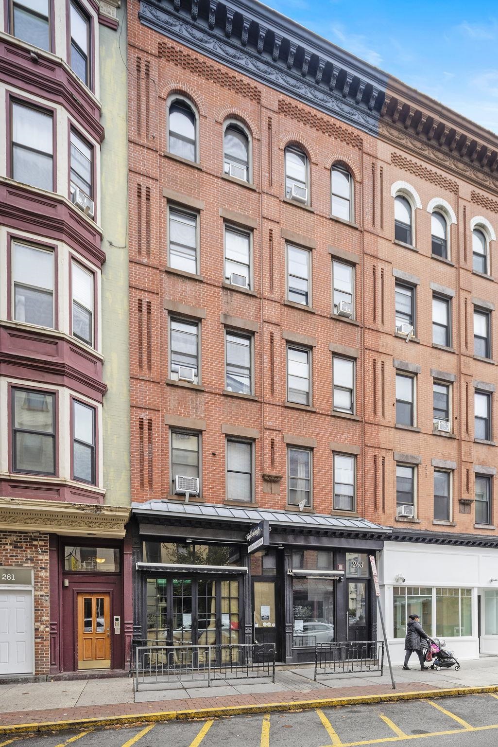 263 1st Street, Unit 2R Hoboken, NJ 07030 - Photo 12 of 13 a front view of a building with a street