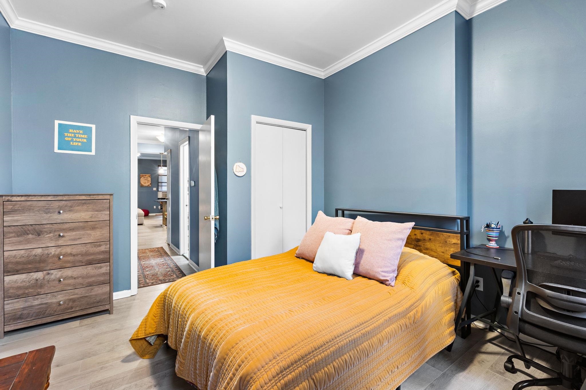 263 1st Street, Unit 2R Hoboken, NJ 07030 - Photo 6 of 13 a bedroom with a bed and wooden floor