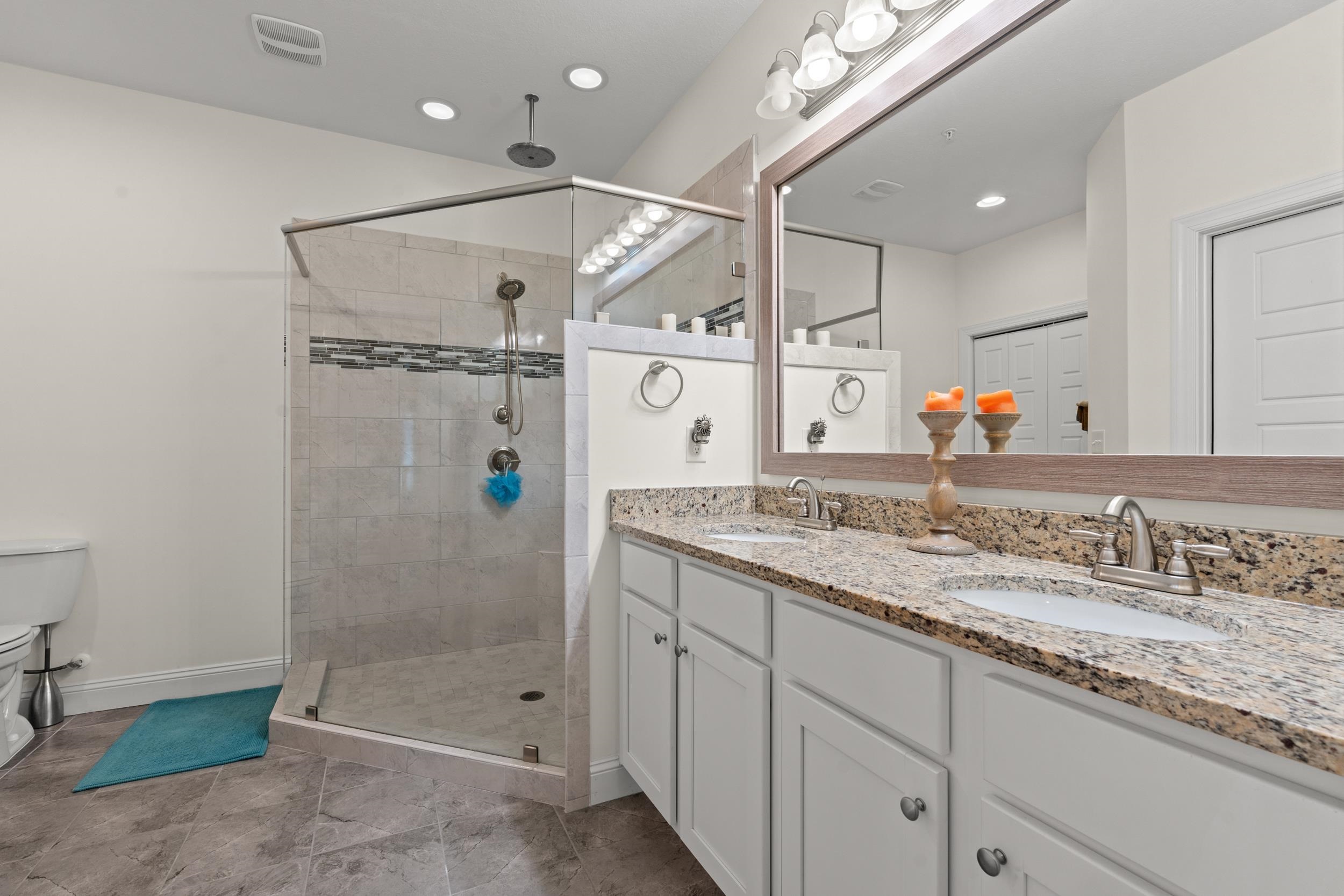900 Jackline Place, Unit 202 Murrells Inlet, SC 29576 - Photo 28 of 39 Full bath featuring double vanity and a shower stall