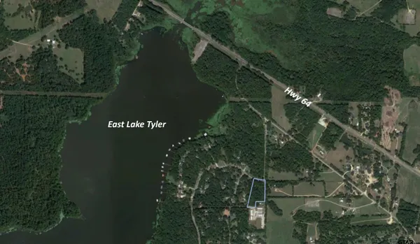 a view of a lake from a yard