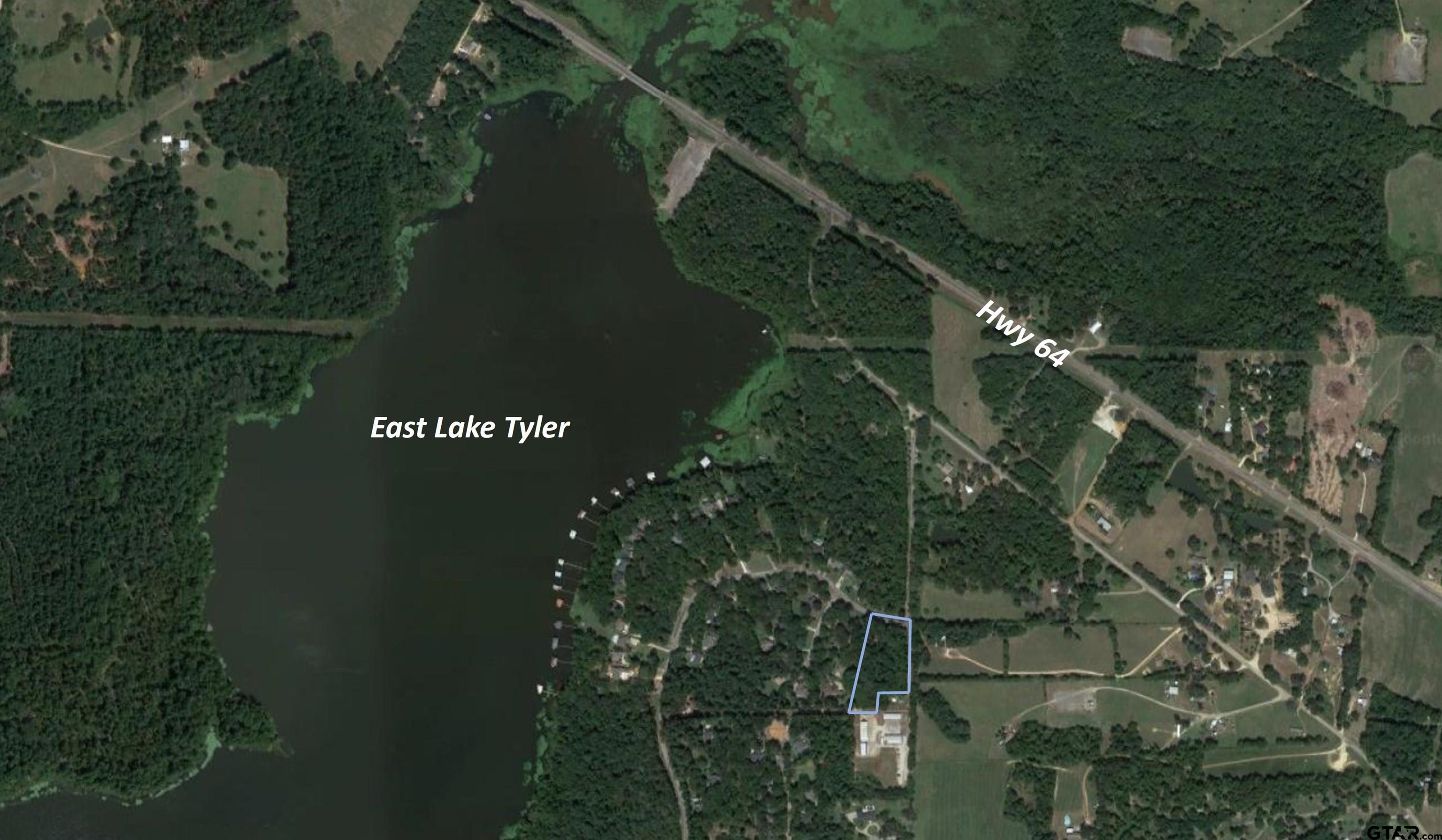 14113-14121 East Ridge Road Arp, TX 75750 - Photo 4 of 7 a view of a lake from a yard