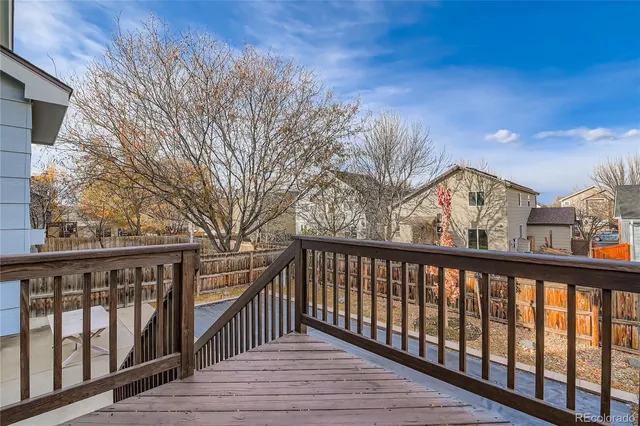 a view of a wooden roof deck