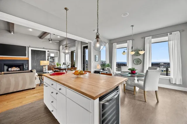 an aerial view of a house with a swimming pool