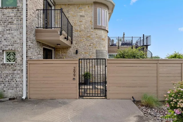 a view of a brick house with a small space