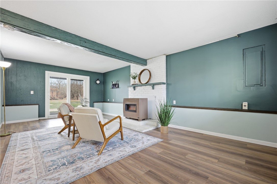 1437 Hosmer Road Somerset, NY 14012 - Photo 23 of 42 walk out lower level family room with propane stov