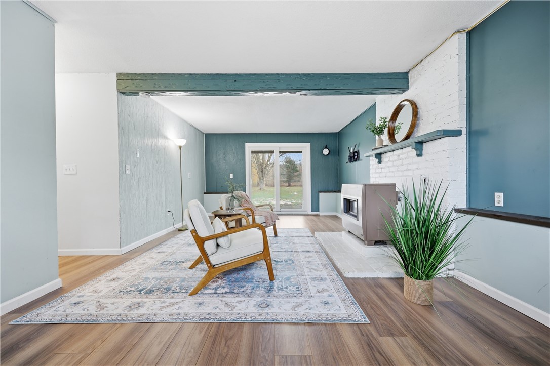 1437 Hosmer Road Somerset, NY 14012 - Photo 24 of 42 walk out lower level family room with propane stov