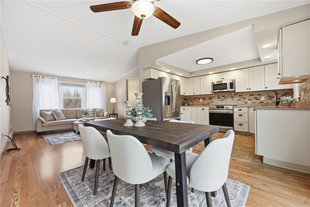 1437 Hosmer Road Somerset, NY 14012 - Photo 6 of 42 open concept living with vaulted ceilings