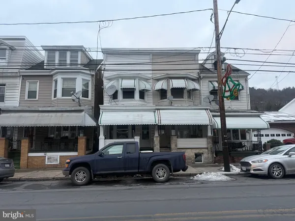 a car parked in front of a building