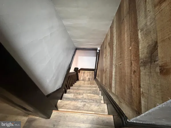 a view of wooden floor and staircase