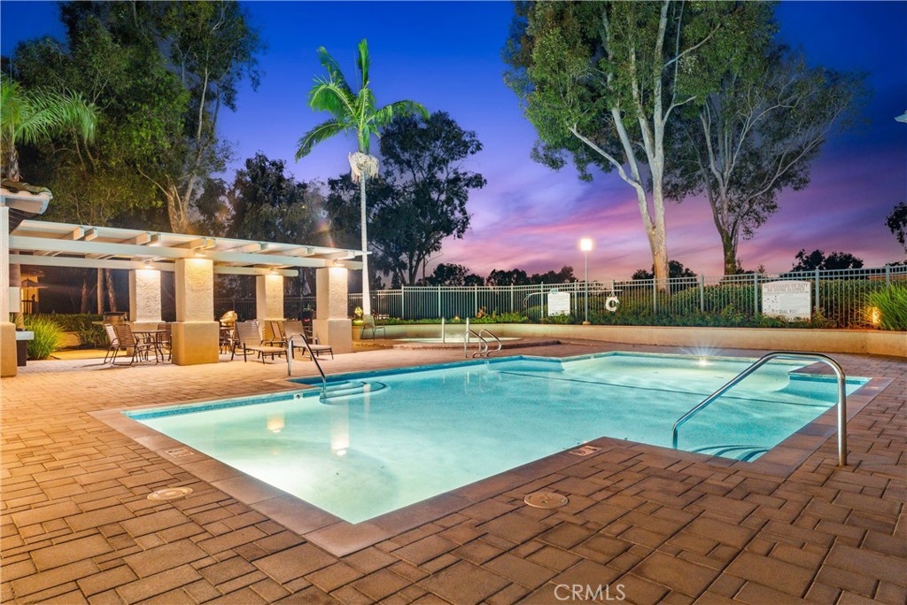 39 Vía Ermitas Rancho Santa Margarita, CA 92688 - Photo 24 of 59 a view of a swimming pool with a house