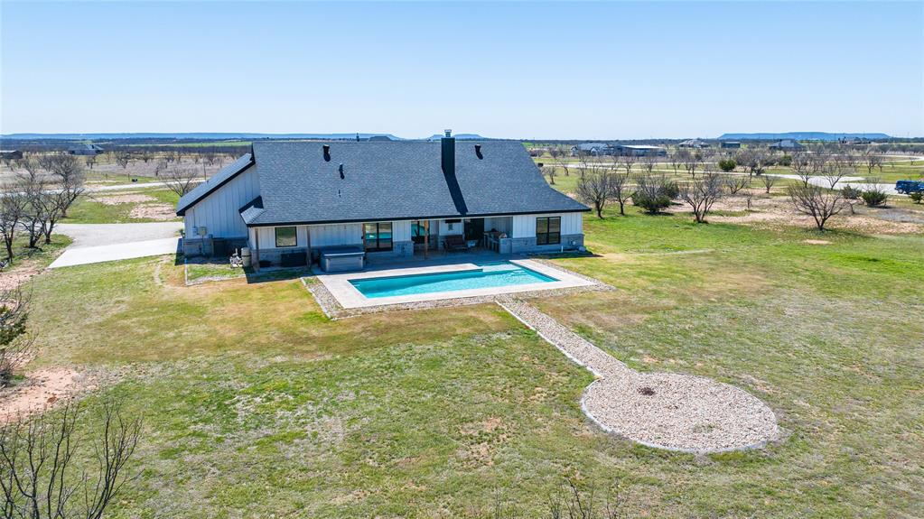 296 Mesquite Ridge Lane Lawn, TX 79530 - Photo 3 of 35 swimming pool view with a outdoor space