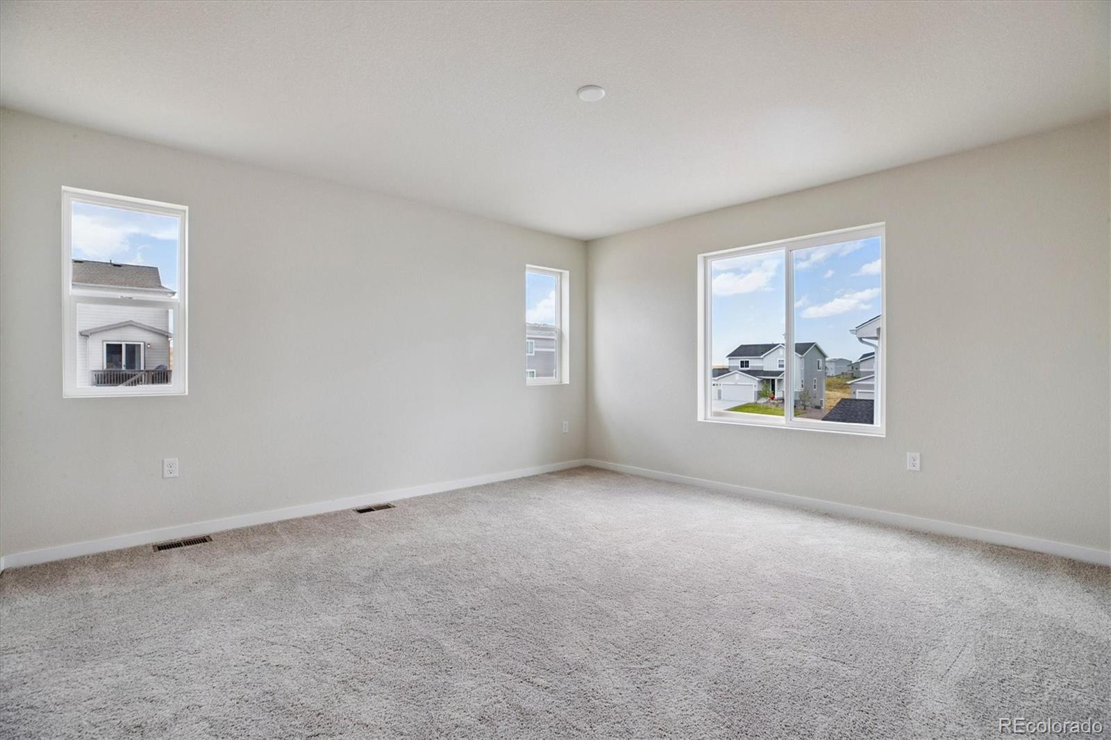 42591 Kinloch Trail Elizabeth, CO 80107 - Photo 12 of 21 an empty room with windows and closet