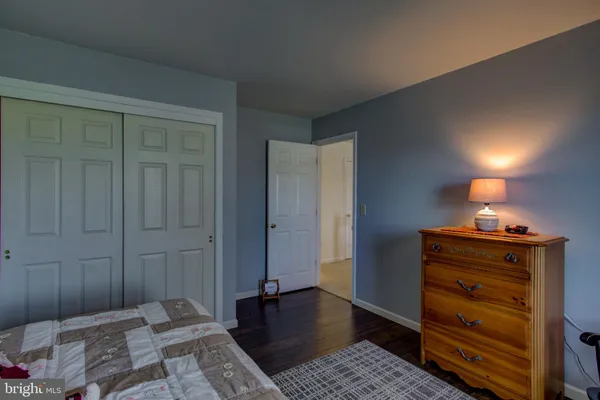 a view of a hallway with a door