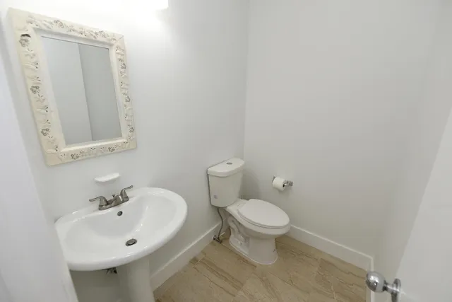 a view of a garden with an outdoor seating