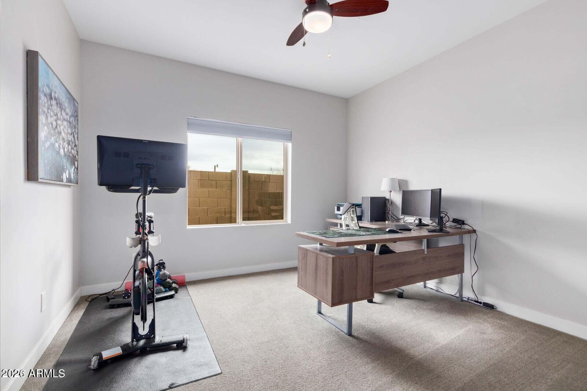 2647 East Contention Mine Road Phoenix, AZ 85032 - Photo 24 of 33 a room with furniture and a window