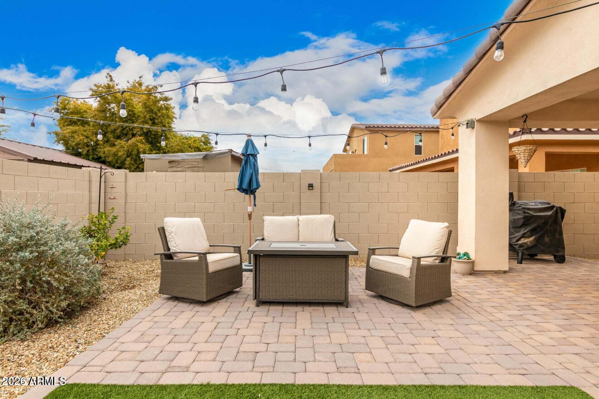 2647 East Contention Mine Road Phoenix, AZ 85032 - Photo 30 of 34 a view of a couches and dinning table in patio