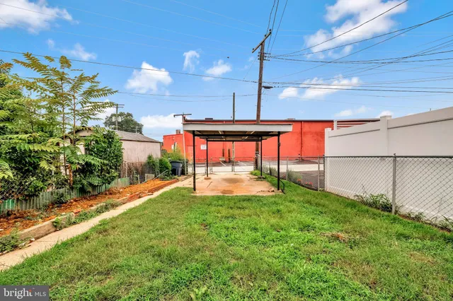 a view of a backyard with a garden
