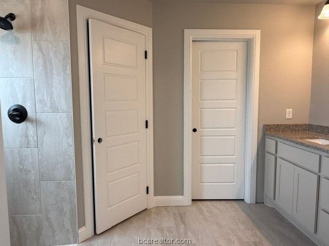 6428 Raleigh Loop College Station, TX 77845 - Photo 16 of 20 a view of a bathroom with a sink