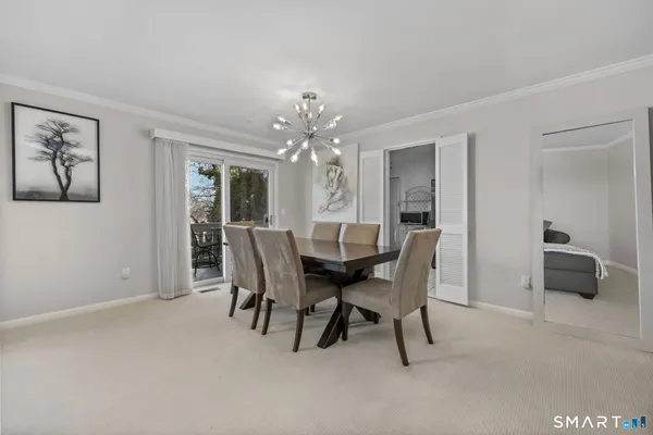 a view of a dining room with furniture