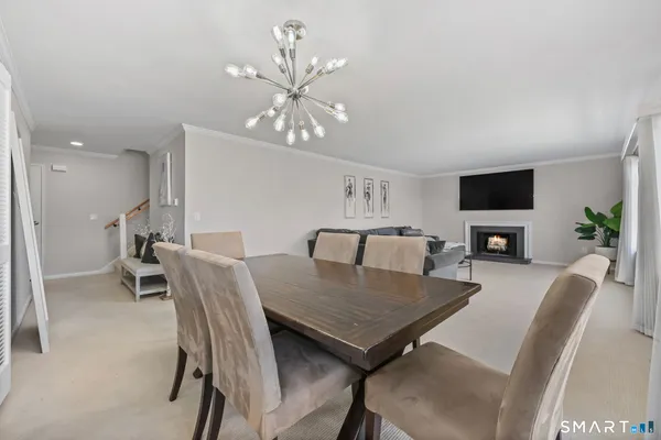 a kitchen with a stove sink and cabinets