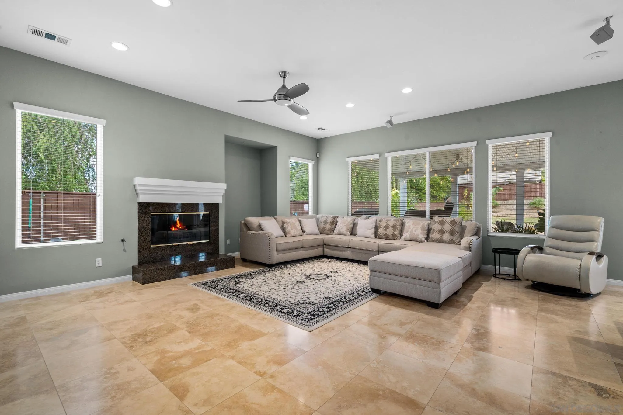 3252 Hidden Estates Lane Escondido, CA 92027 - Photo 12 of 32 a living room with furniture window and a fireplace