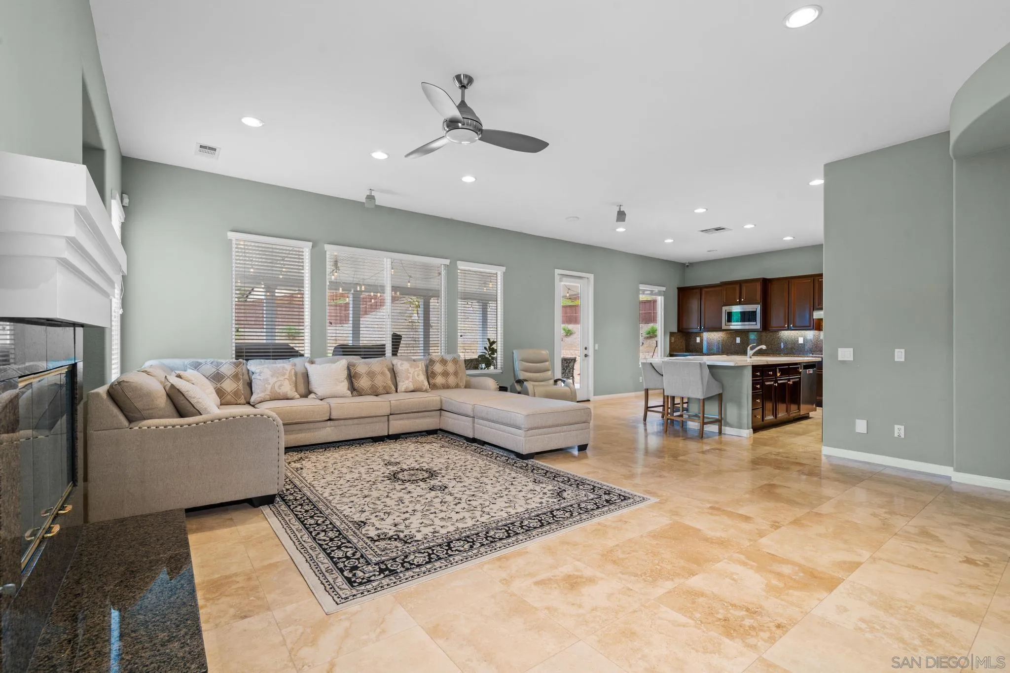 3252 Hidden Estates Lane Escondido, CA 92027 - Photo 13 of 32 a living room with furniture and view of kitchen