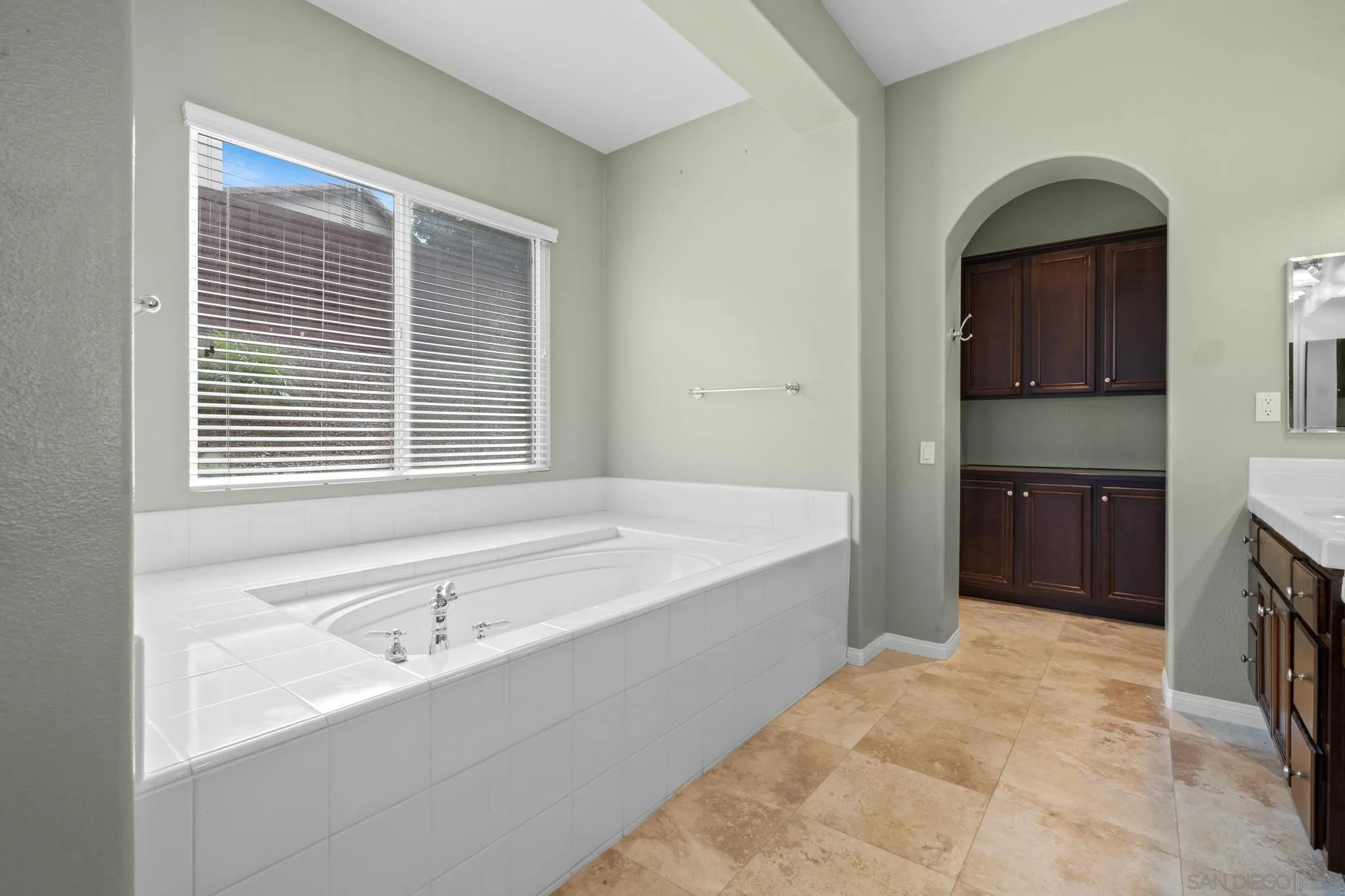 3252 Hidden Estates Lane Escondido, CA 92027 - Photo 17 of 32 a bathroom with a bathtub and a sink
